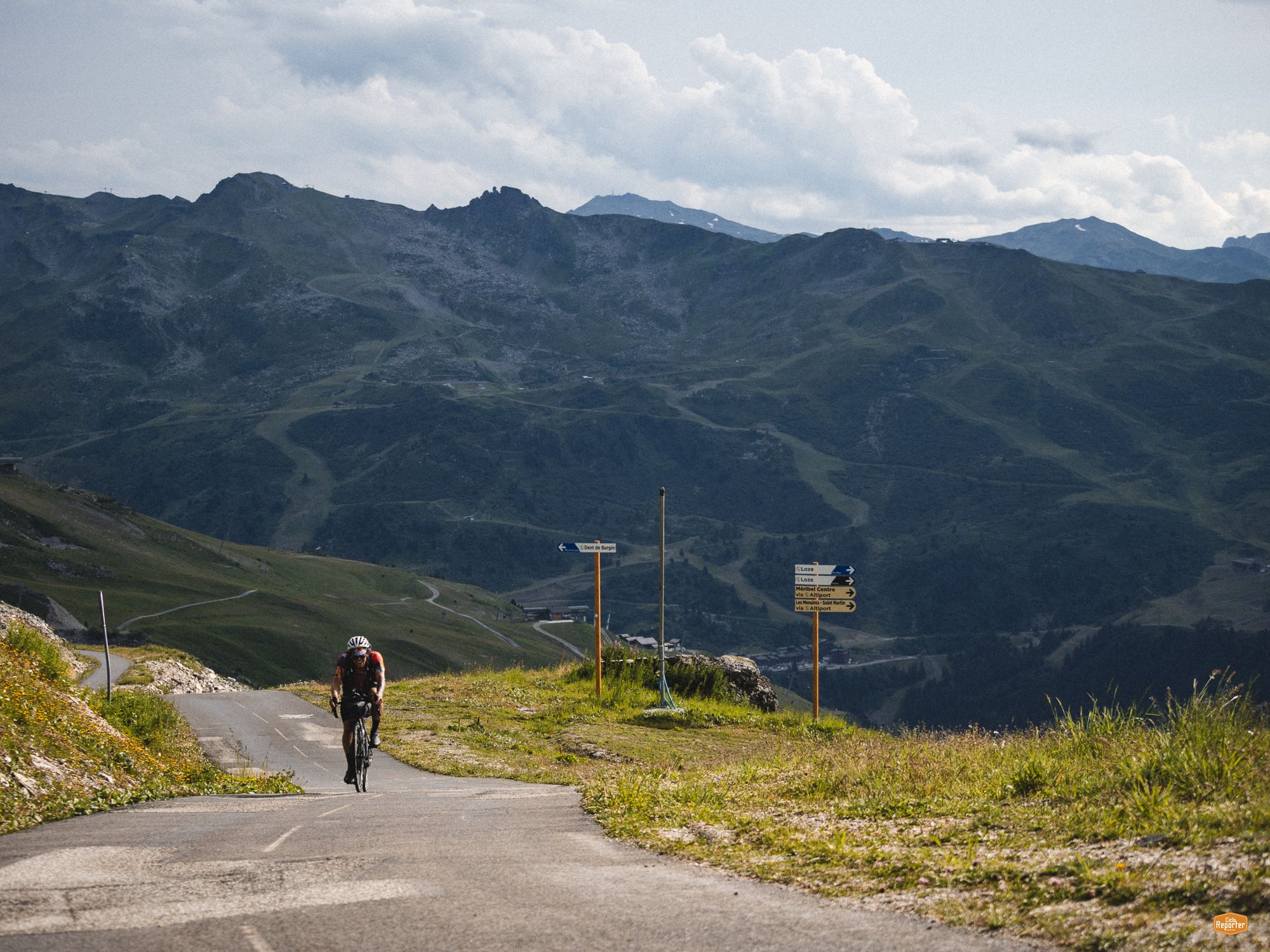 Noah climbing an alpine pass during the Three Peaks Bike Race